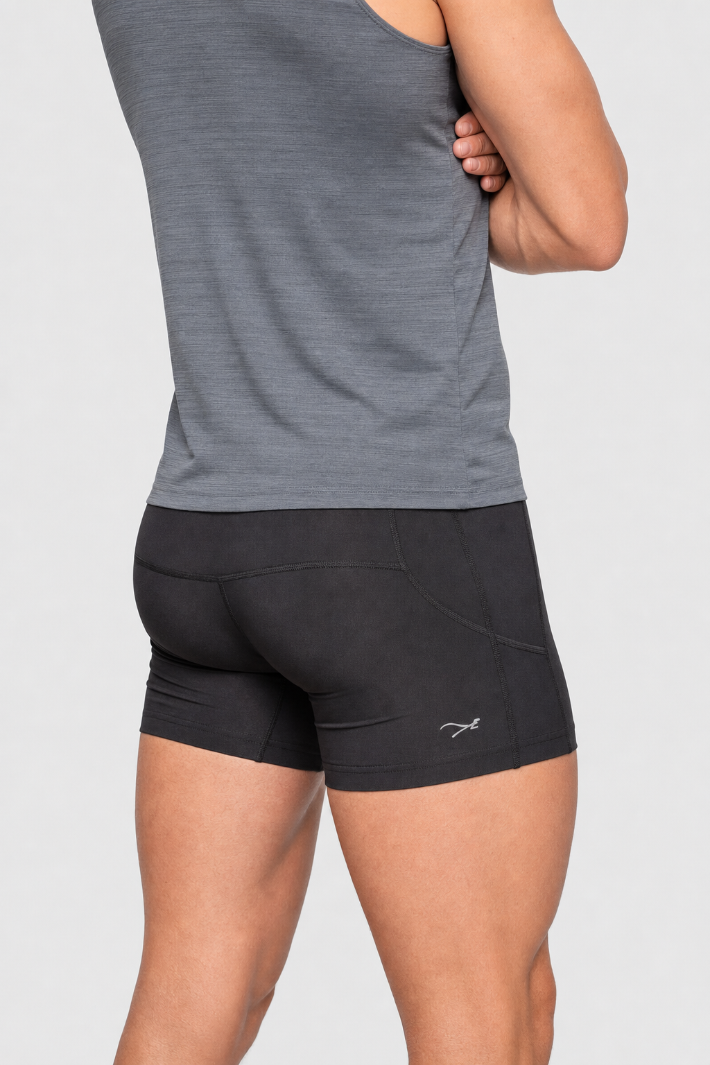 Bazlisk Stride 5 Half Tight black running short, rear three-quarter detail shot with logo